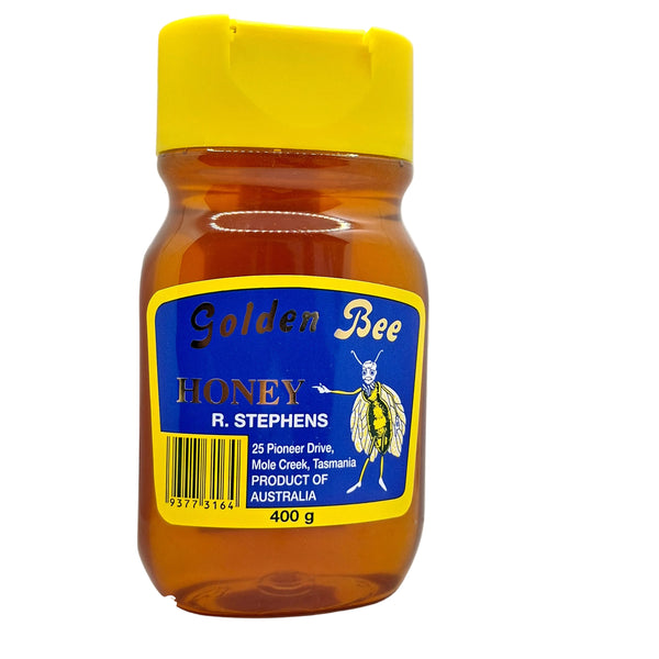 A 400g plastic squeeze bottle  of Golden Bee Honey by R. Stephens.